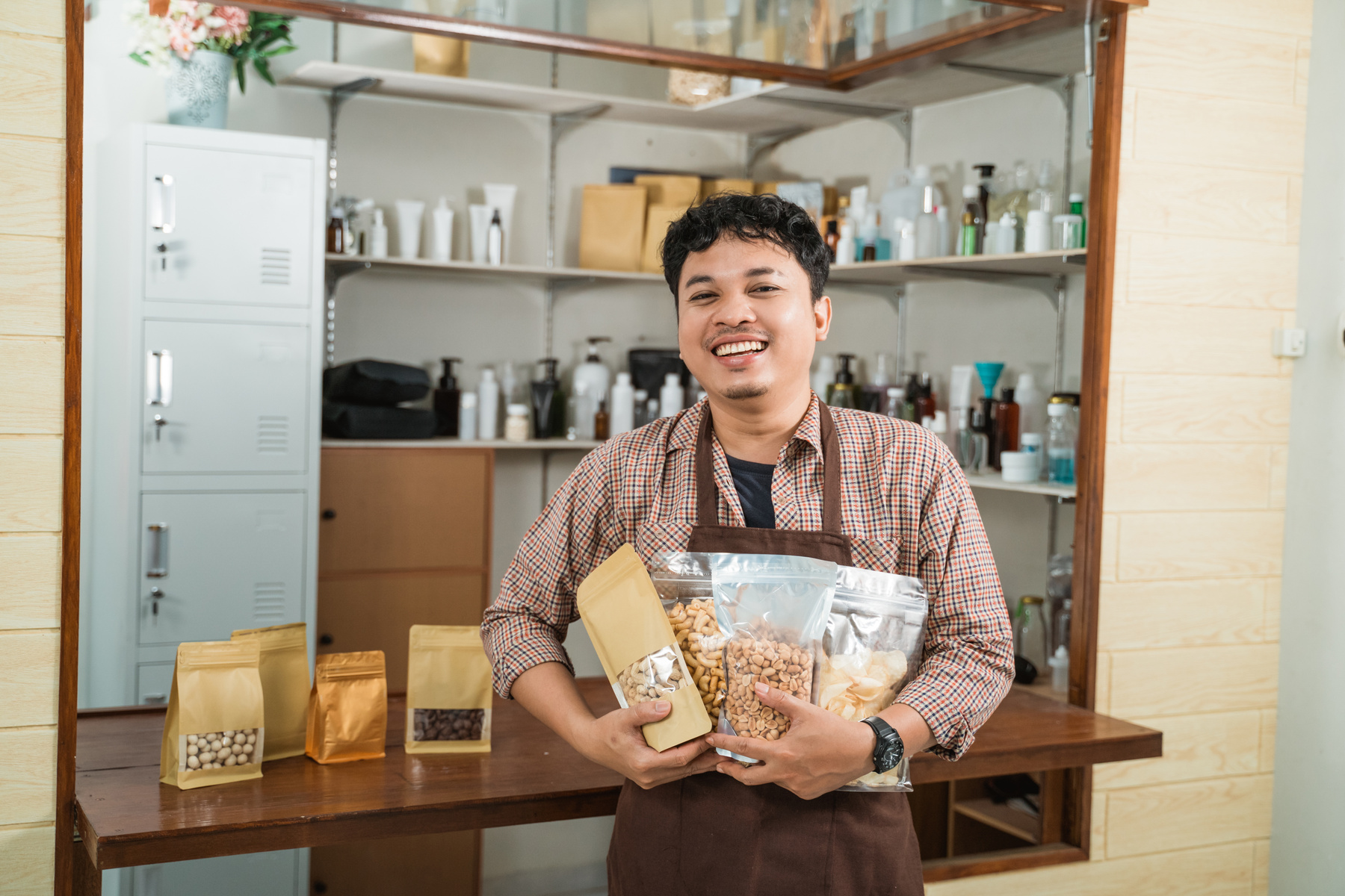 Portrait Young Man Selling Packaged Products